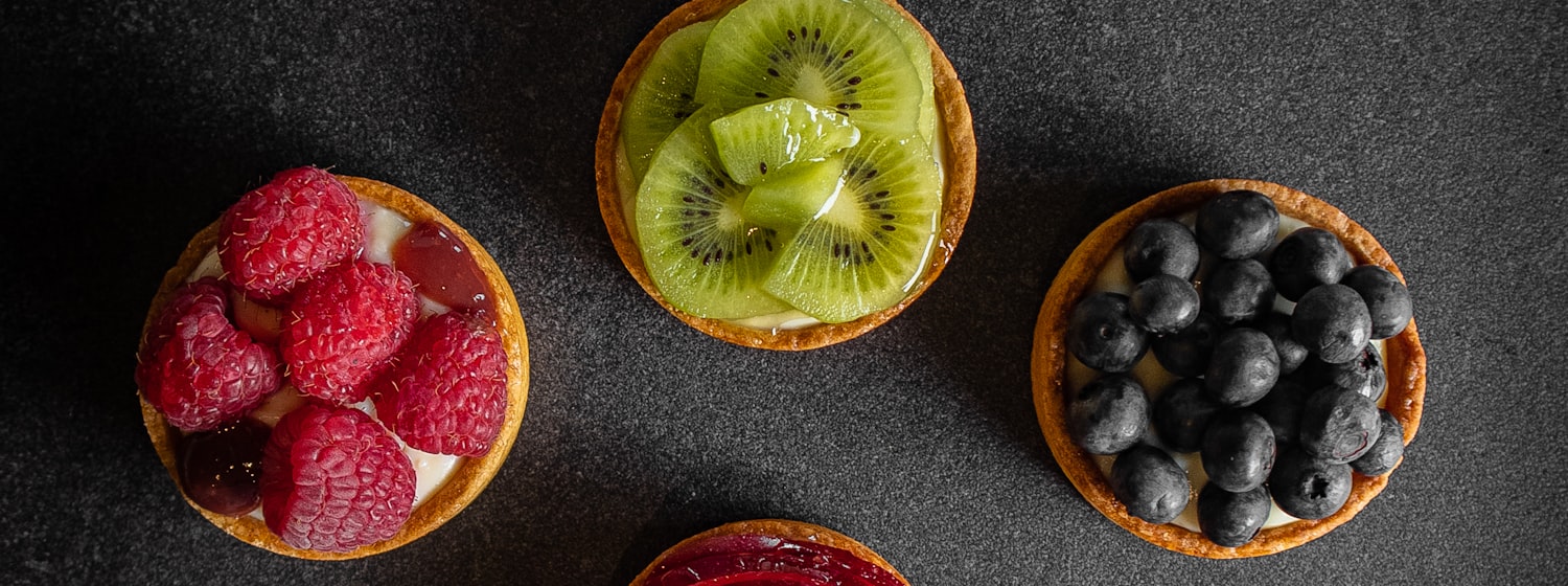 A pastry tart topped with fresh berries